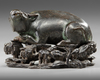A CHINESE BRONZE BUFFALO ON A STAND, MING DYNASTY (1368-1644)