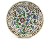 AN IZNIK 'STORM IN A TEACUP' DESIGN POTTERY DISH, OTTOMAN TURKEY, 16TH CENTURY