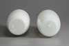 A pair of Chinese milky-white glass vases