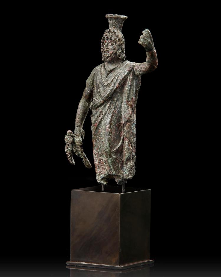 A ROMAN BRONZE STATUETTE OF SERAPIS, CIRCA 2ND-3RD CENTURY A.D.