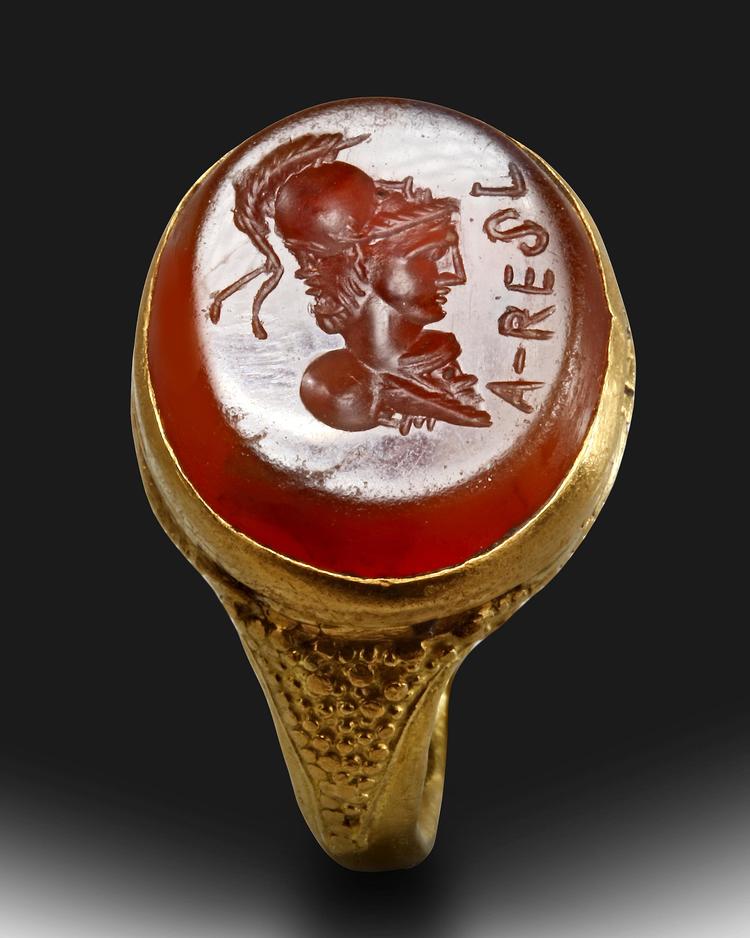 A ROMAN GRYLLUS INTAGLIO SET IN A GOLD RING, CIRCA 2ND-3RD CENTURY A.D.