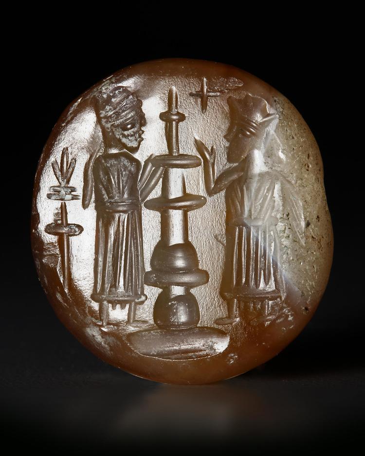 A SASSANIAN LARGE AGATE DOMED SEAL WITH TWO FIGURES AND ALTAR, CIRCA 5TH-7TH CENTURY A.D.