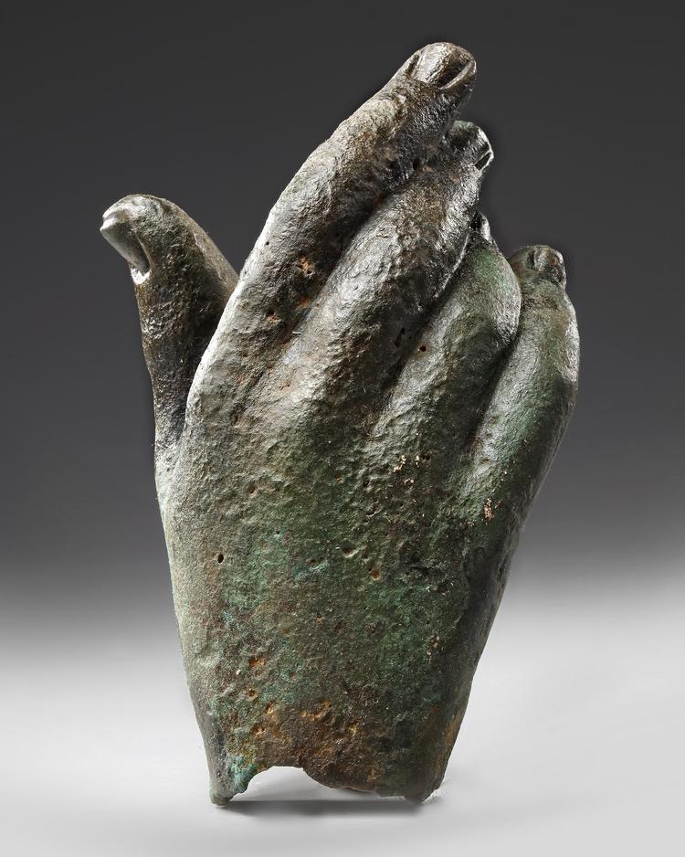 A ROMAN BRONZE HAND, CIRCA 1ST-2ND CENTURY A.D.