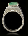 AN EMERALD SEAL SILVER RING