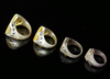 FOUR AGATE SILVER RINGS