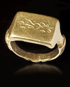 A GOLD SEAL RING