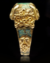 A TURQUOISE SEAL GOLD RING