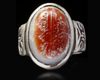 AN AGATE SEAL SILVER RING, 11TH CENTURY