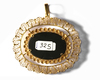 A GOLD MOUNTED JADE PENDANT