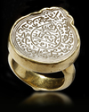 A CRYSTAL SEAL GOLD RING