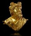 A ROMAN REPOUSSÉ GOLD BUST OF A MAN WITH WINGED HEAD, CIRCA 2ND CENTURY A.D.