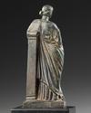 A ROMAN BRONZE STATUETTE OF APHRODITE / VENUS LEANING ON A PILLAR, CIRCA 1ST CENTURY B.C - A.D.