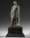 A ROMAN BRONZE STATUETTE OF APHRODITE / VENUS LEANING ON A PILLAR, CIRCA 1ST CENTURY B.C - A.D.