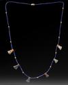 AN EGYPTIAN LOTUS FLOWER LAPIS LAZULI AMULET NECKLACE, CIRCA 1550-1570 B.C.