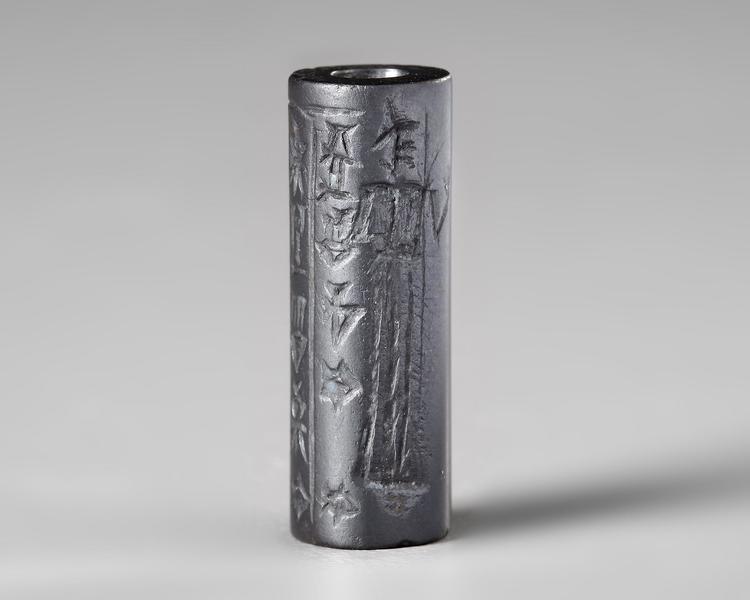 A WESTERN ASIATIC HEMATITE CYLINDER SEAL, CIRCA 1900-1700 B.C.
