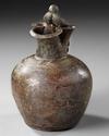 A ROMAN BRONZE TREFOIL OINOCHOE, CIRCA 1ST A.D.