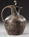 A ROMAN BRONZE TREFOIL OINOCHOE, CIRCA 1ST A.D.