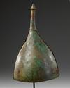A WESTERN ASIATIC POINTED AND CONICAL BRONZE HELMET, CIRCA 800-600 B.C.