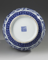 A CHINESE UNDER-GLAZE BLUE AND WHITE MING-STYLE PEAR SHAPED VASE, QING DYNASTY (1644-1911)