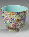 A CHINESE FAMILLE-ROSE 'MILLE-FLEURS' CUP, 19TH-20TH CENTURY