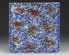A CHINESE UNDERGLAZE COPPER RED AND BLUE TILE, QING DYNASTY (1644-1911)