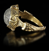 A CRYSTAL SEAL GOLD RING