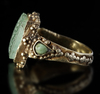 AN EMERALD SEAL GOLD RING