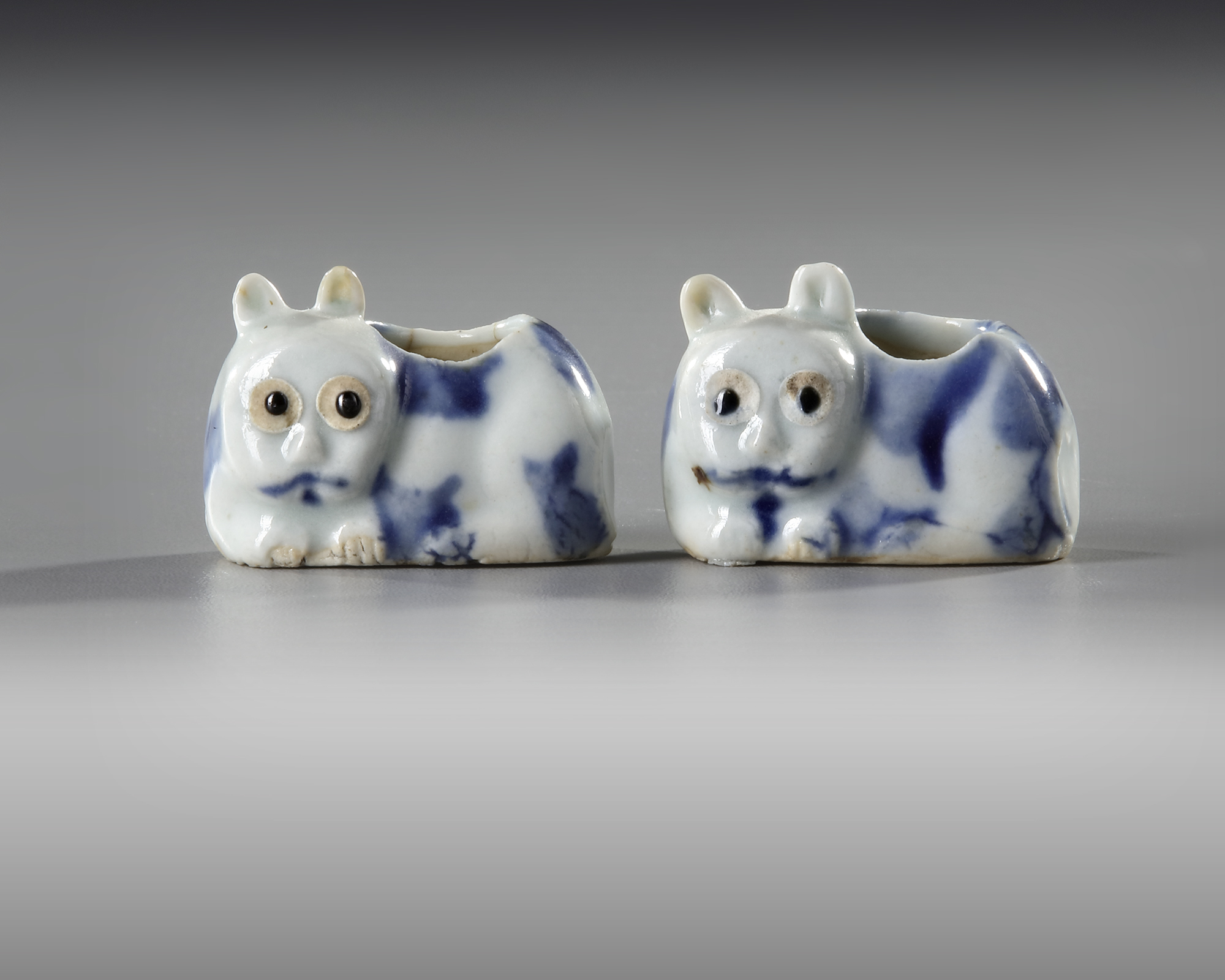 A PAIR OF CHINESE BLUE AND WHITE CAT SHAPED BRUSH WASHERS, MING DYNASTY  (1368-1644)