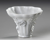 A CHINESE BLANC DE CHINE  LIBATION CUP, 18TH CENTURY