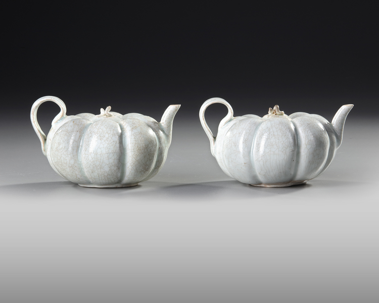 A PAIR OF CHINESE 'QINGBAI' TEAPOTS WITH COVERS, SOUTHERN SONG (1127-1279)