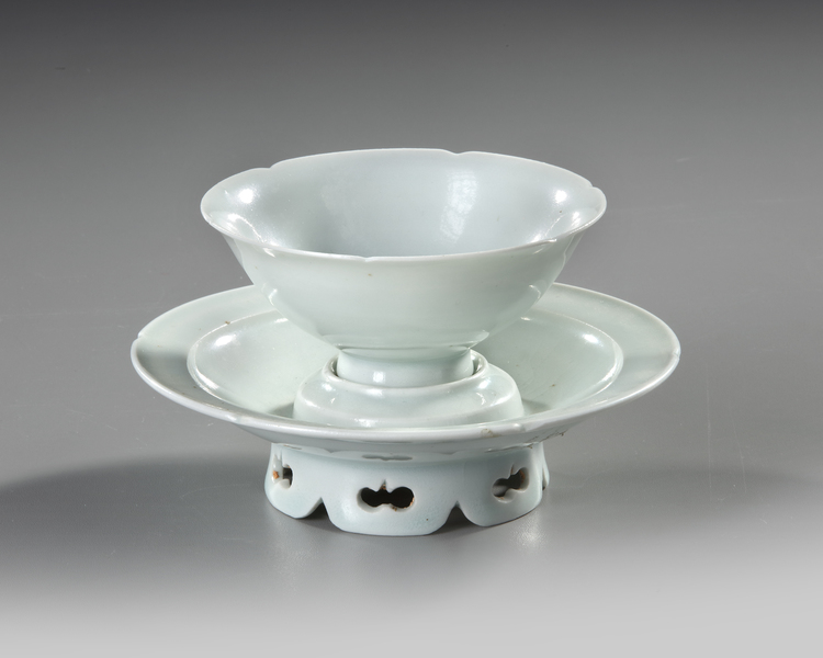 A CHINESE 'QINGBAI' CUP AND STAND, SONG DYNASTY (960-1279 AD)
