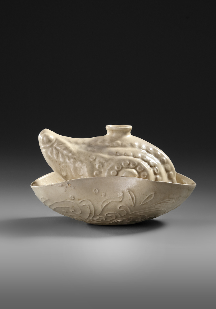 A CHINESE WHITE GLAZED FROG-FORM WATER DROPPER, MING DYNASTY (1368–1644)