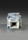 A  CHINESE BLUE AND WHITE FACETED VASE, MING DYNASTY, LATE 15TH CENTURY