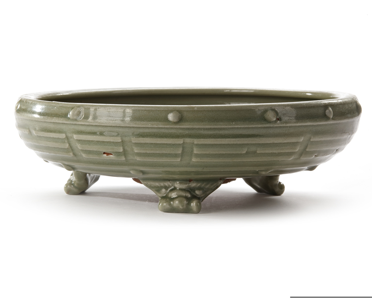 A CHINESE LONGQUAN CELADON 'EIGHT TRIGRAMS' TRIPOD CENSER LATE YUAN/EARLY MING DYNASTY (13TH-14TH CENTURY)