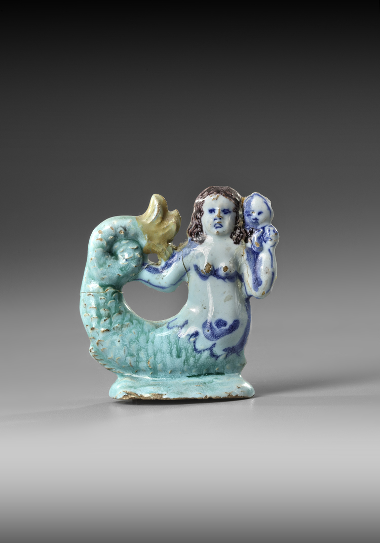 A FAIENCE MERMAID, PROBABLY BRUSSELS, 18TH CENTURY