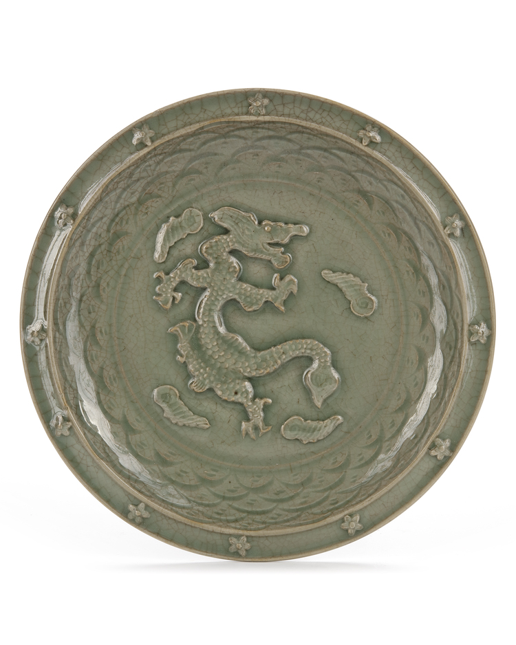 A CHINESE LONGQUAN CELADON MOULDED DRAGON DISH, MING DYNASTY (1368-1644)