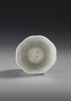 A CHINESE LOTUS SHAPED BLANC DE CHINE CUP, 18TH CENTURY