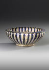 A KASHAN POTTERY BOWL, PERSIA, 13TH CENTURY