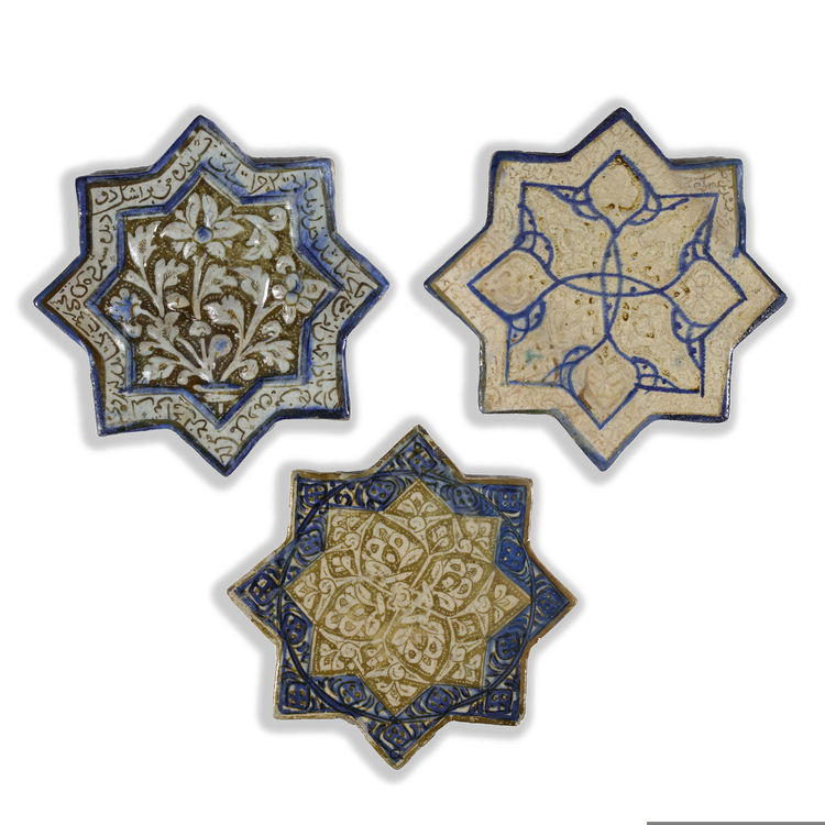 THREE STAR-SHAPED KASHAN TILES, PERSIA, 13TH-14TH CENTURY