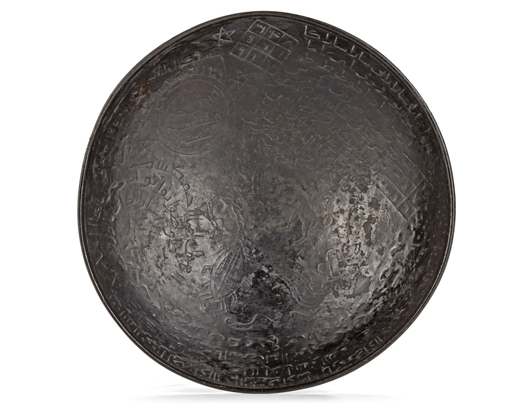 AN ISLAMIC TINNED-BRONZE TALISMANIC BOWL, 13TH-14TH CENTURY