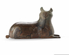 A KHORASAN BRONZE WEIGHT FIGURINE IN THE FORM OF A LION, PERSIA, 12TH CENTURY