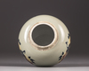 A Chinese celadon-ground 'nine peaches' ovoid jar