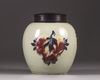 A Chinese celadon-ground 'nine peaches' ovoid jar