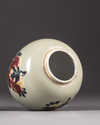 A Chinese celadon-ground 'nine peaches' ovoid jar
