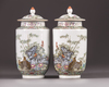 A pair of small Chinese famille rose lantern vases and covers