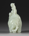 A CELADON JADE CARVING OF TWO BOYS WASHING AN ELEPHANT, 19TH CENTURY