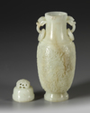 A CHINESE CARVED JADE VASE AND COVER, QING DYNASTY (1644-1911)