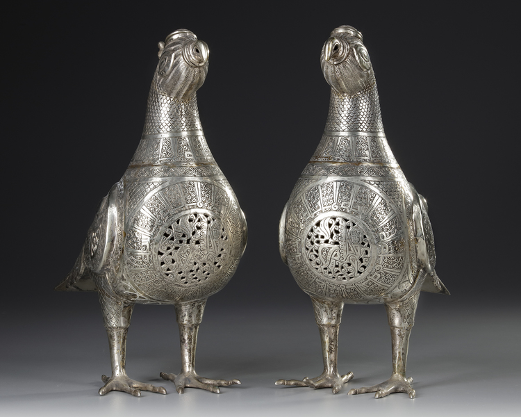 A PAIR OF SILVER INLAID BIRD INCENSE BURNERS, KHURASAN-STYLE, 20TH CENTURY