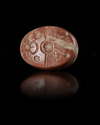 A NEO BABYLONIAN STAMP SEAL IN RED STONE, 6TH-7TH CENTURY BC