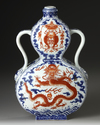 A CHINESE IRON-RED DECORATED DOUBLE GOURD MOON FLASK, 19TH-20TH CENTURY
